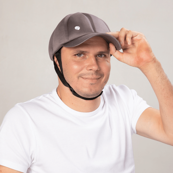 Man in baseball cap on sale